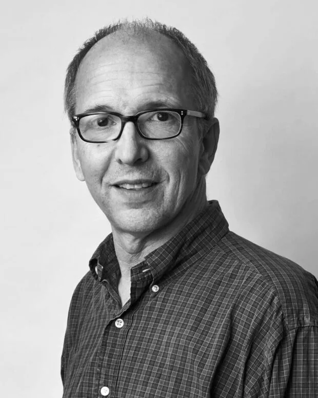 A black and white portraits of Scott Stuart