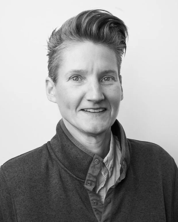 A black and white portrait of Dee Dee Germain