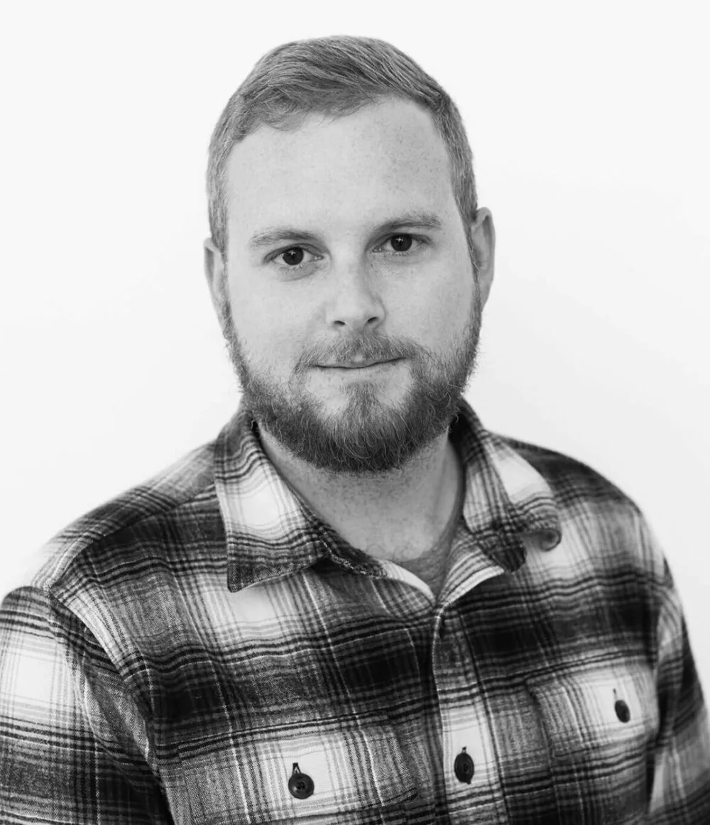 A black and white portrait of Nate Barrett
