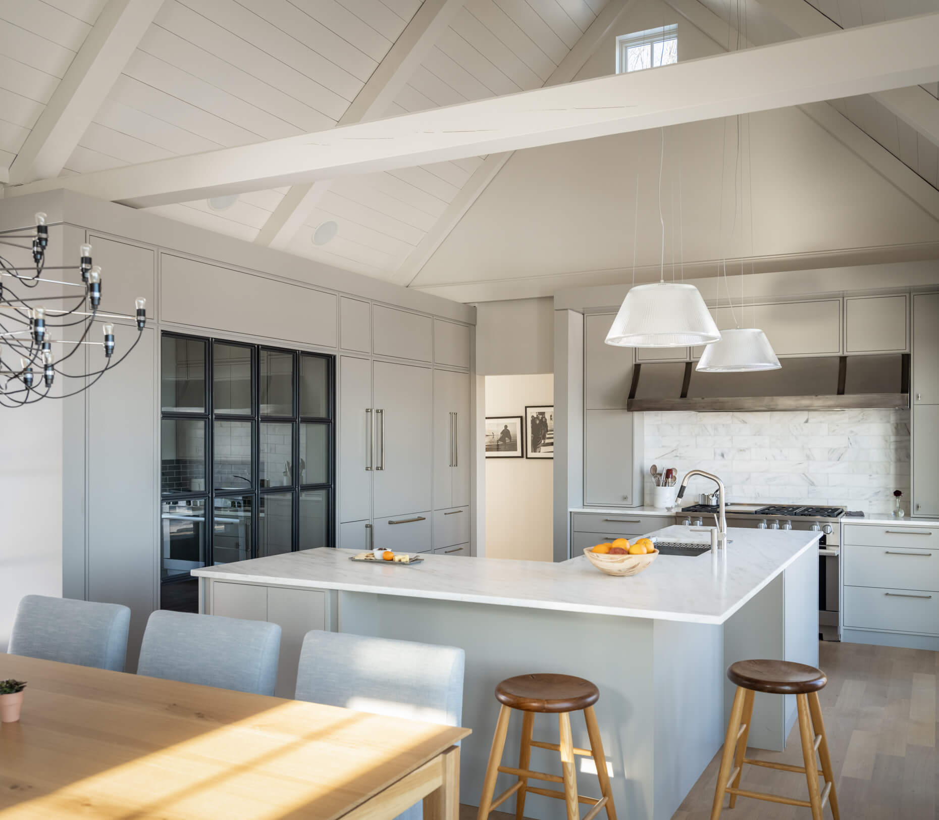 Chimney Rock Kitchen, with a dining room table, kitchen island with granite countertops, and a stove range