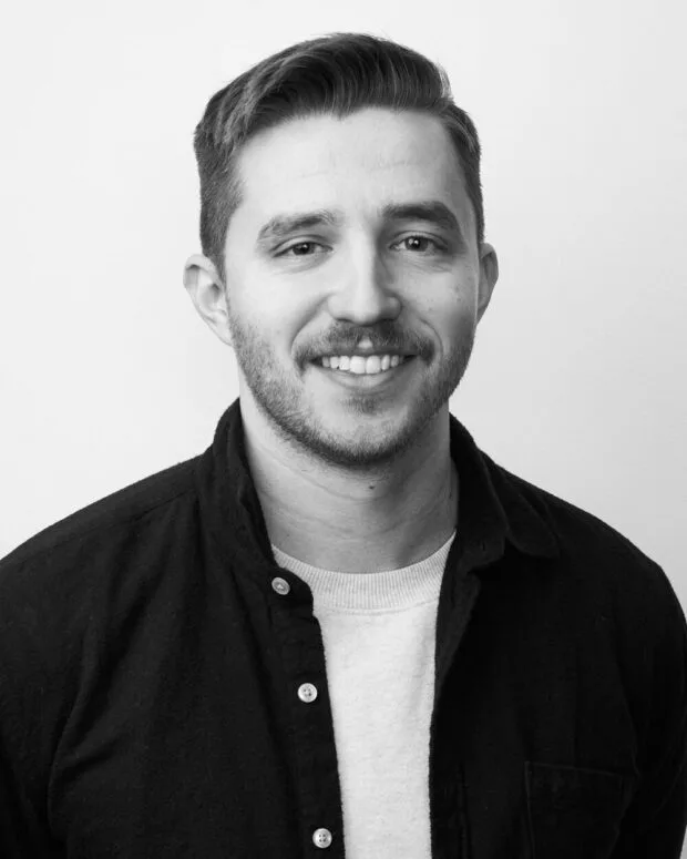 A black and white portrait of Christian Johnson