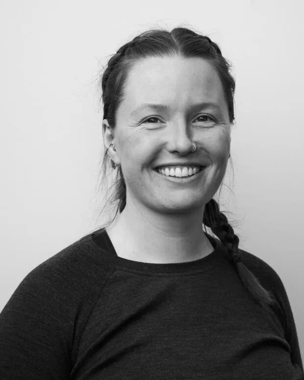 A black and white portrait of Chelsea Miller