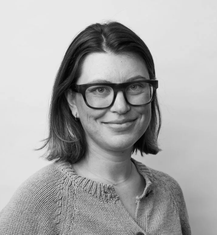 A black and white portrait of Markie Mello