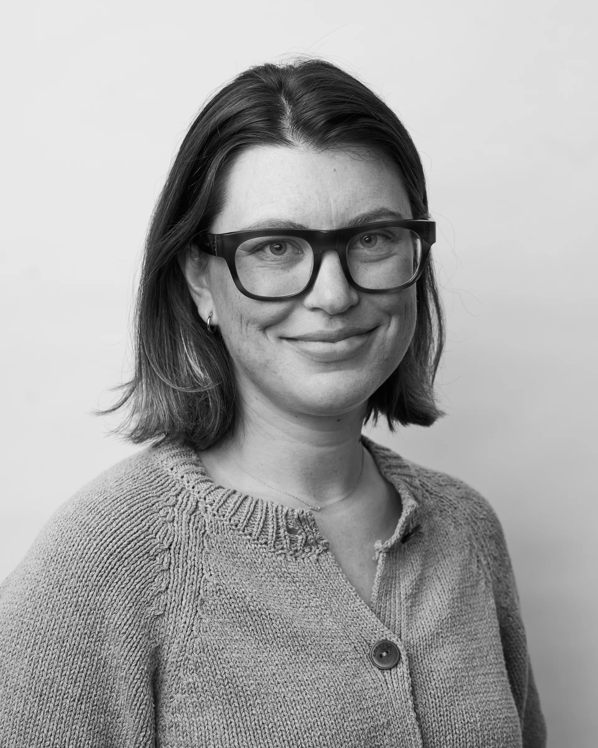 A black and white portrait of Markie Mello