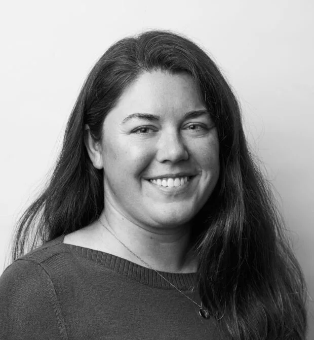 A black and white portrait of Amy Andrew