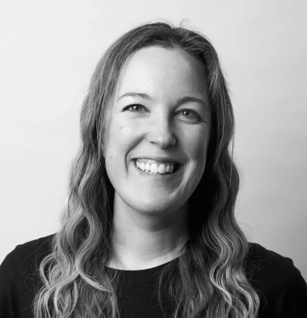 A black and white portrait of Danielle Camarata