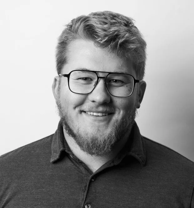 A black and white portrait of Isaiah Ricker