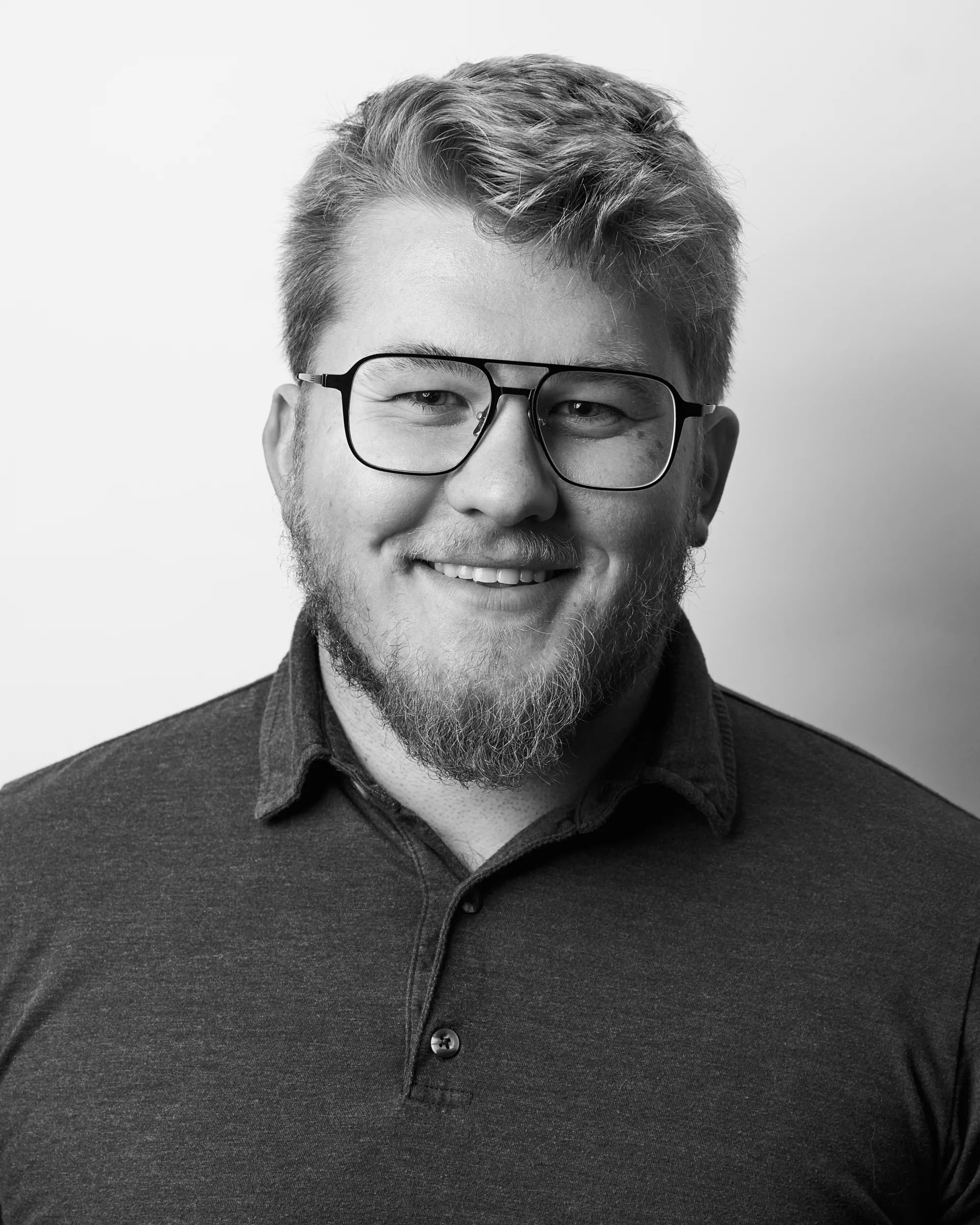 A black and white portrait of Isaiah Ricker