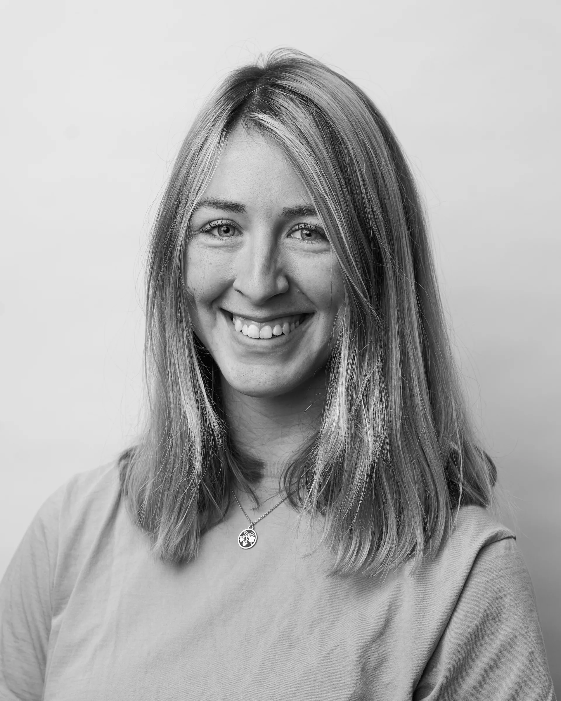 A black and white portrait of Tali Amero