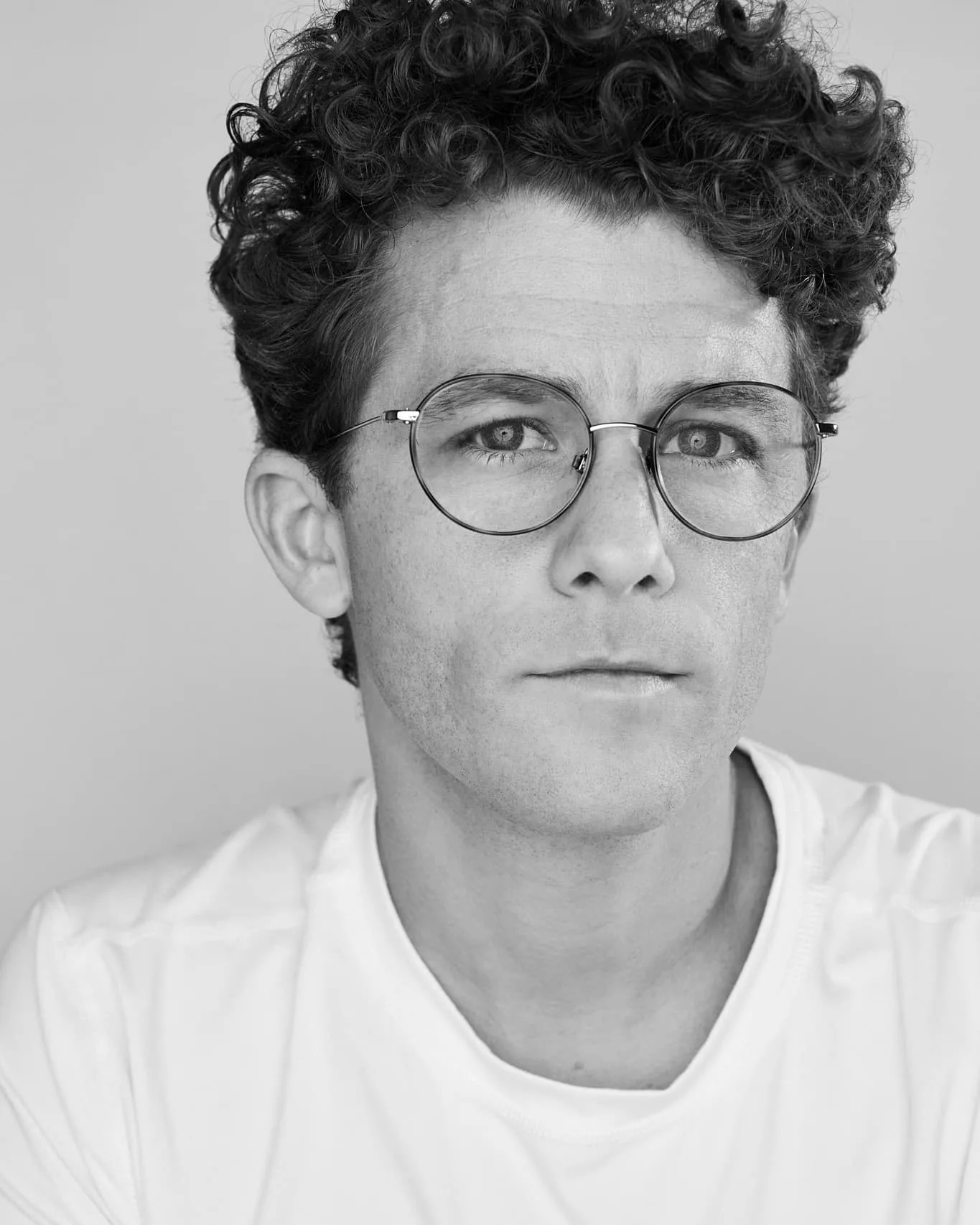 A black and white portrait of Skyler Fike