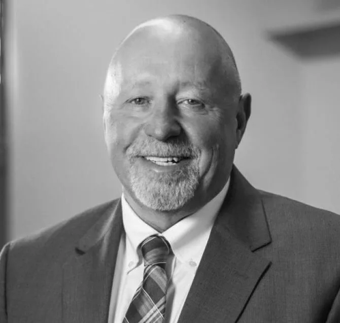 A black and white portrait of Andrew Sturgeon
