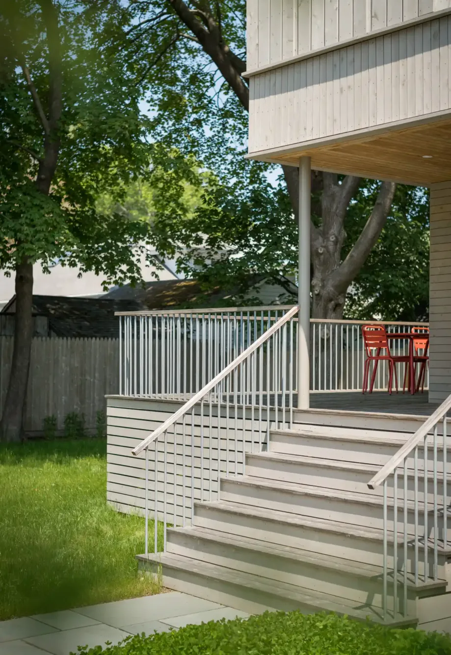 Exterior stairs leading to modern porch of renovated South Portland cottage